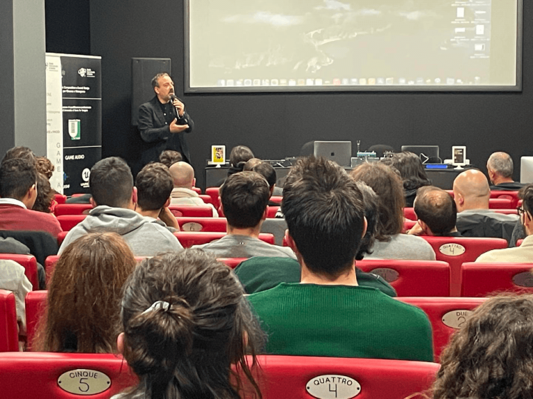 Luigi Sansò durante un workshop per i suoi studenti
