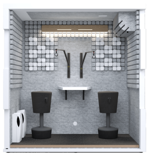 Interno del box Studiobricks Podcast Duo, vista frontale con tavolo e bracci microfonici