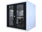 Vista esterna angolare del box insonorizzato Studiobricks Podcast Round con porta a vetri